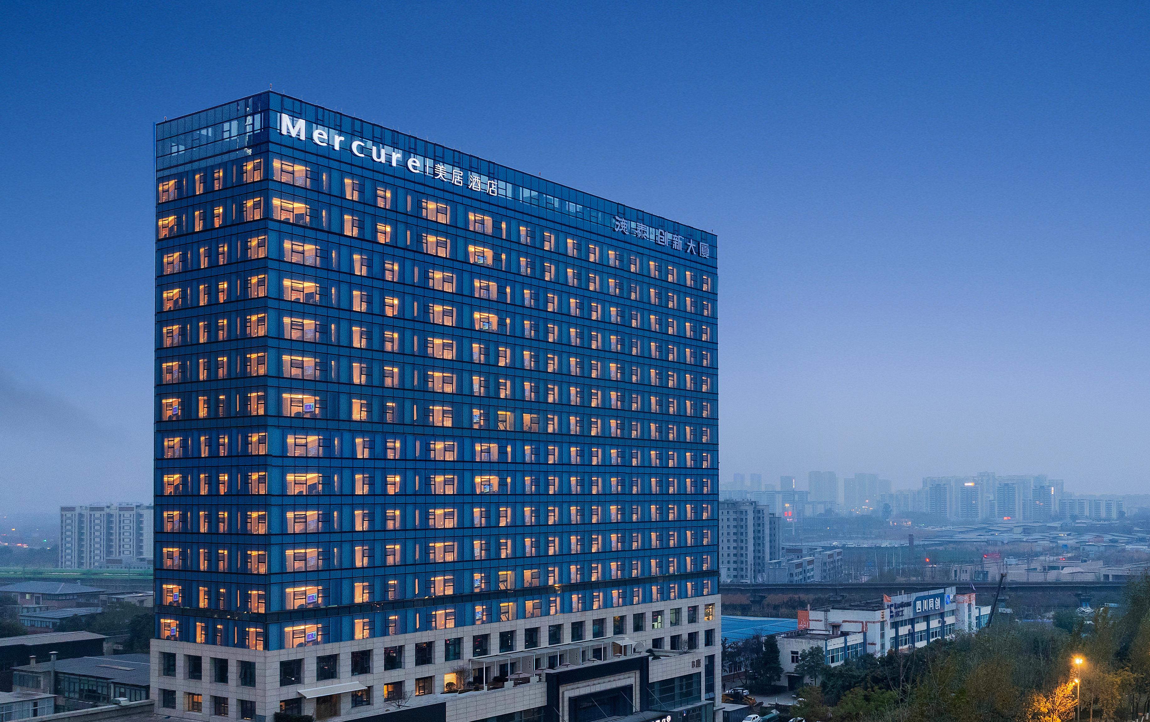 成都龙潭美居酒店